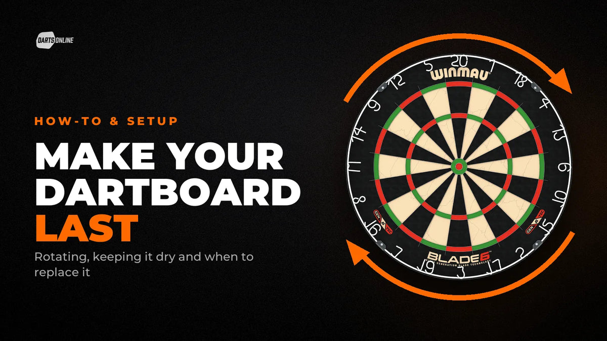 How to look after a dartboard: a Winmau Blade 6 with orange arrows showing the board being rotated
